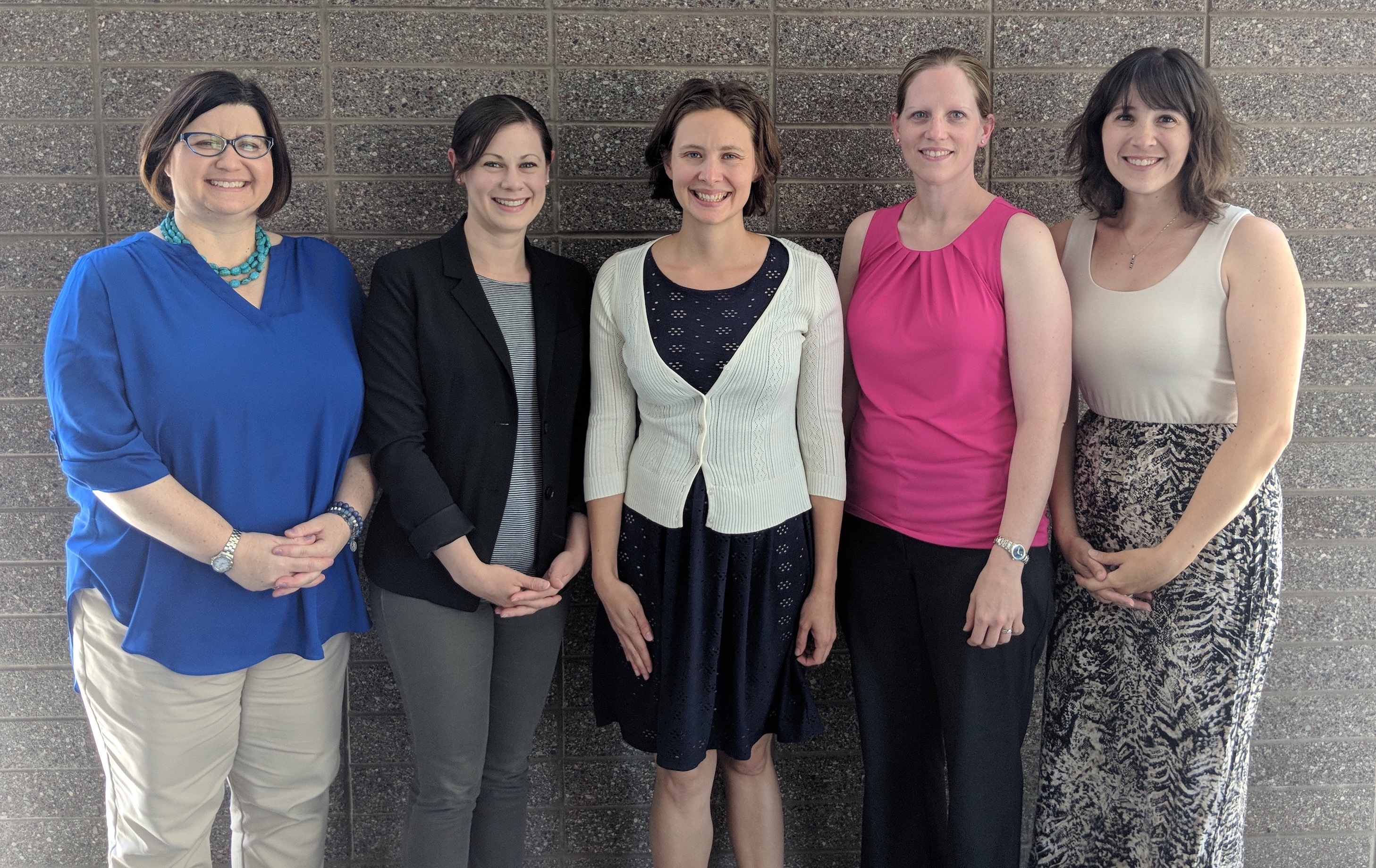 Authors gathered together for a photo. Pictured from left to right are Lisa Cahill, Molly Rentscher, Kelly Chase, Darby Simpson, and Jessica Jones